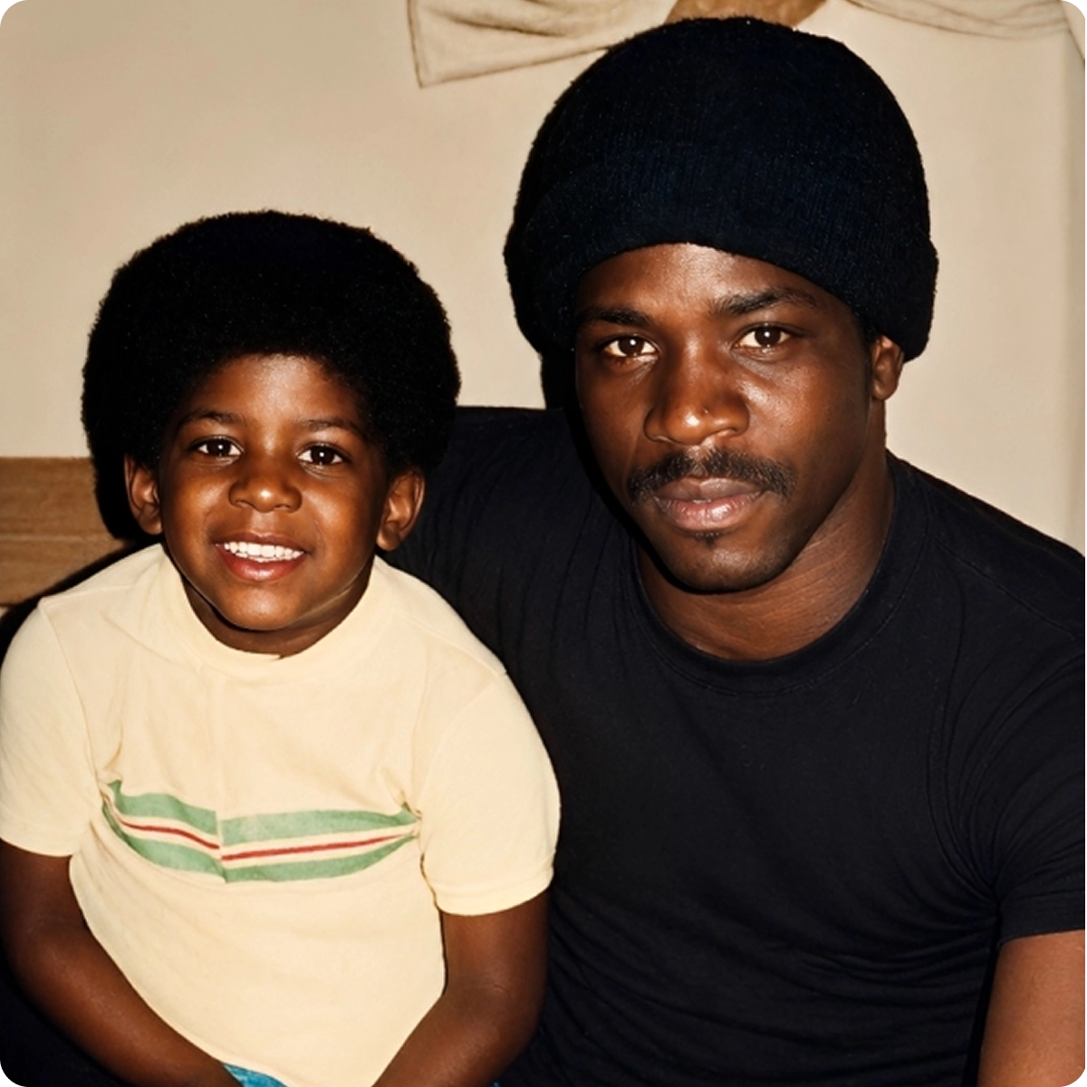 Man and child smiling for a photo.